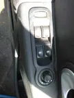 Regulador de puerta delantera con motor