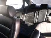 Seat belt adjustment rail