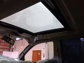 Takaoven ikkunan nostin moottorilla