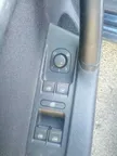 Regulador manual de la ventanilla delantera